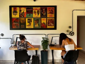 Two women working in the coworking area in Guatapé