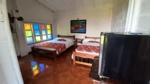 Two double beds room of Riverside’s partner hotel in Jerico, Colombia