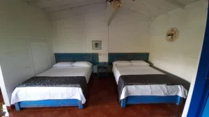 Two beds room of Riverside’s partner hotel in Jerico, Colombia